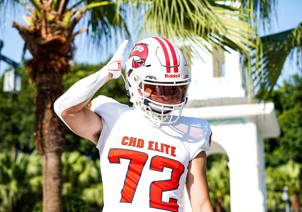 White and red CHD football jersey with number 72, front view