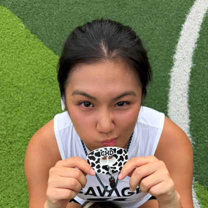 Real CHD mouthguard player photo — square composition — chd cow print design football mouthguard