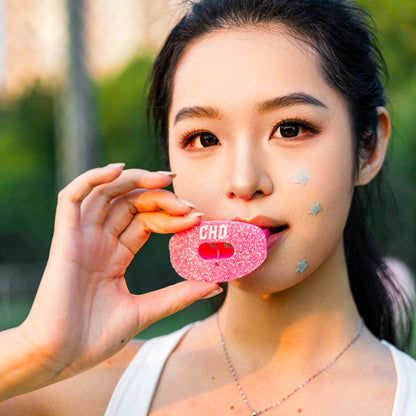 CHD Diamond Pink on Pink mouthguard shown with player — pink diamond finish