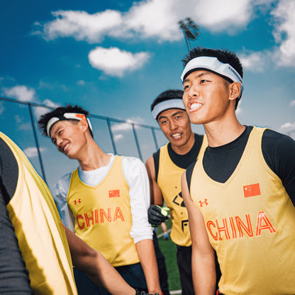 Flag football athletes wearing white headbands