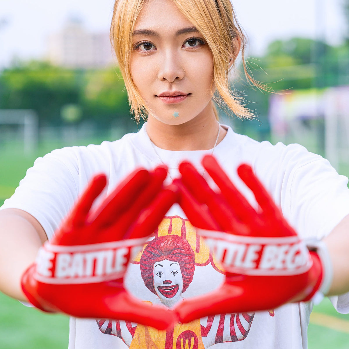Real customer photo of CHD G1 Red Receiver Football Gloves; square crop from original CHD photo